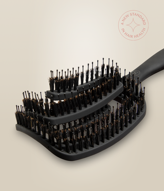Angled close-up of the OmniFlex Vent Brush's open-frame head and ball-tipped bristles.